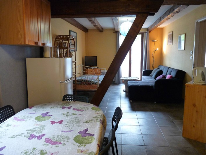 Location de vacances - Appartement à Ban-de-Laveline - coin repas et coin salon petit gîte