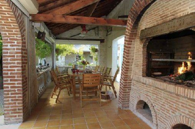 Location de vacances - Chambre d'hôtes à Marchais - salle de petit déjeuner et table d'hôte d'été