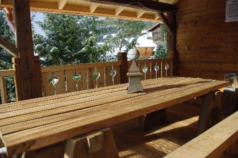 Location de vacances - Chalet à Manigod - Terrasse couverte