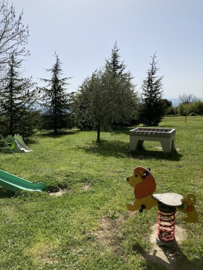Location de vacances - Appartement à Saissac - babyfoot jeu sur ressort toboggans ....