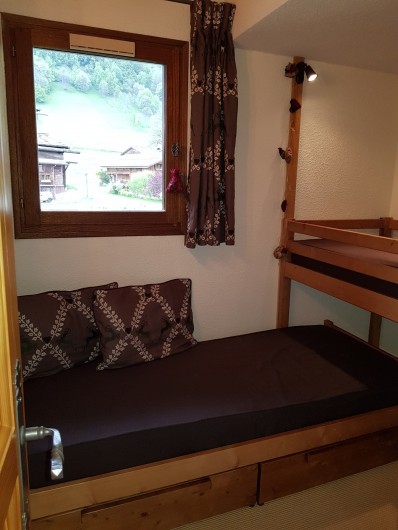 Location de vacances - Appartement à Le Grand-Bornand - Chambre lits superposés 1/2