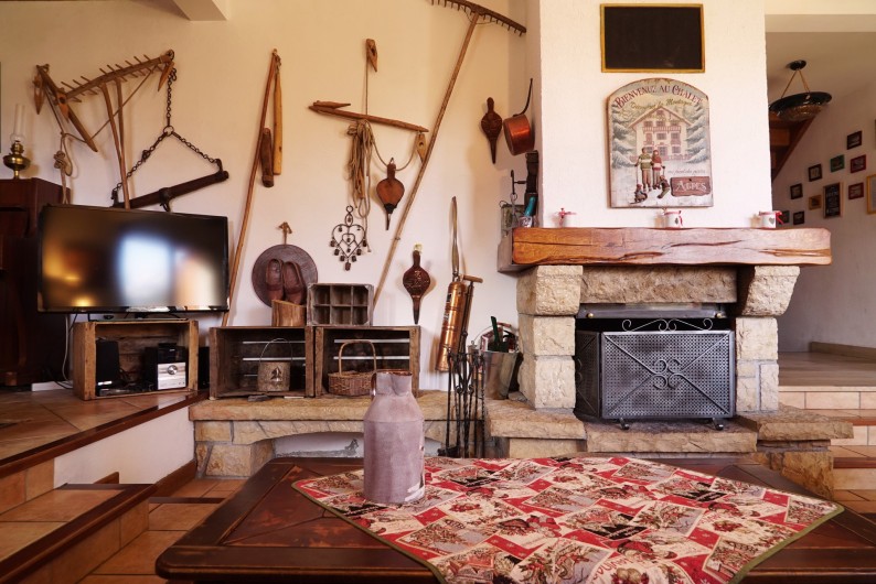 Location de vacances - Chalet à Les Deux Alpes - cheminée