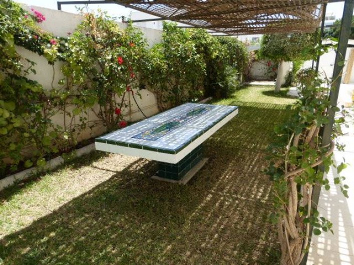 Location de vacances - Villa à Hammamet - Coin repas coté jardin  et barbecue