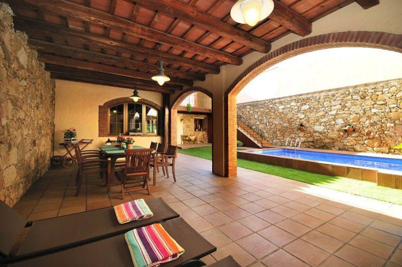 Location de vacances - Mas à Sant Antoni de Calonge - Porche à côté de la piscine