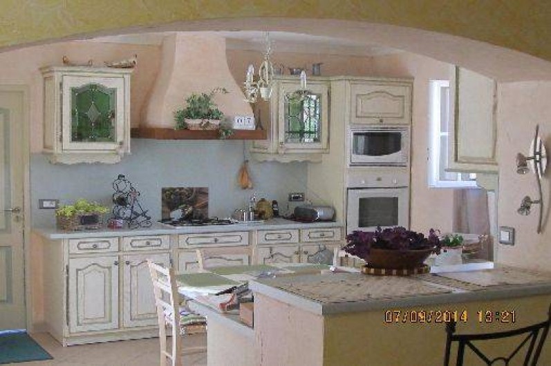 Location de vacances - Bungalow - Mobilhome à Paris - Vue de la cuisine donnant sur la terrasse