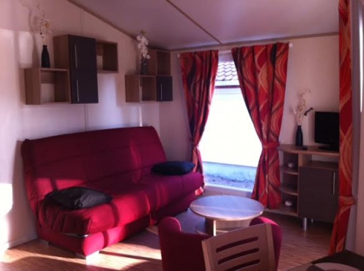 Location de vacances - Chalet à Parentis-en-Born - salon canapé convertible