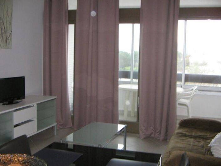 Location de vacances - Appartement à Saint-Cyprien Plage - Séjour et loggia