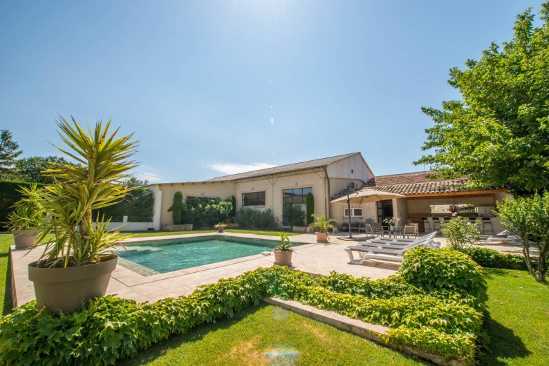 Location de vacances - Mas à Visan - piscine, jardin et plage de piscine